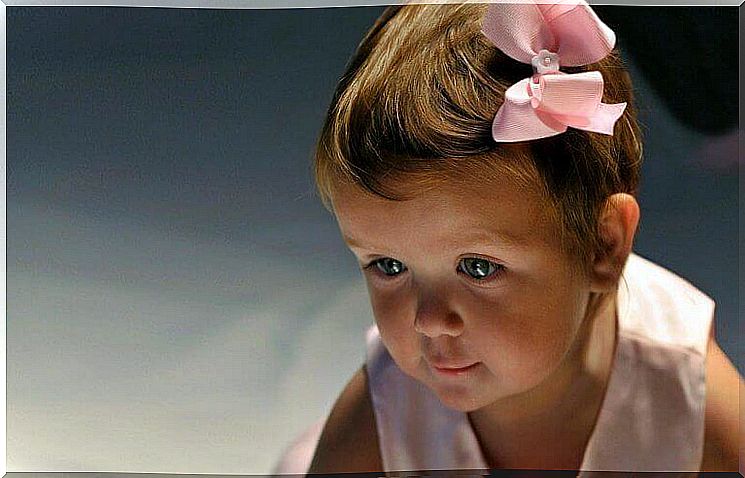 Little girl with pink bow