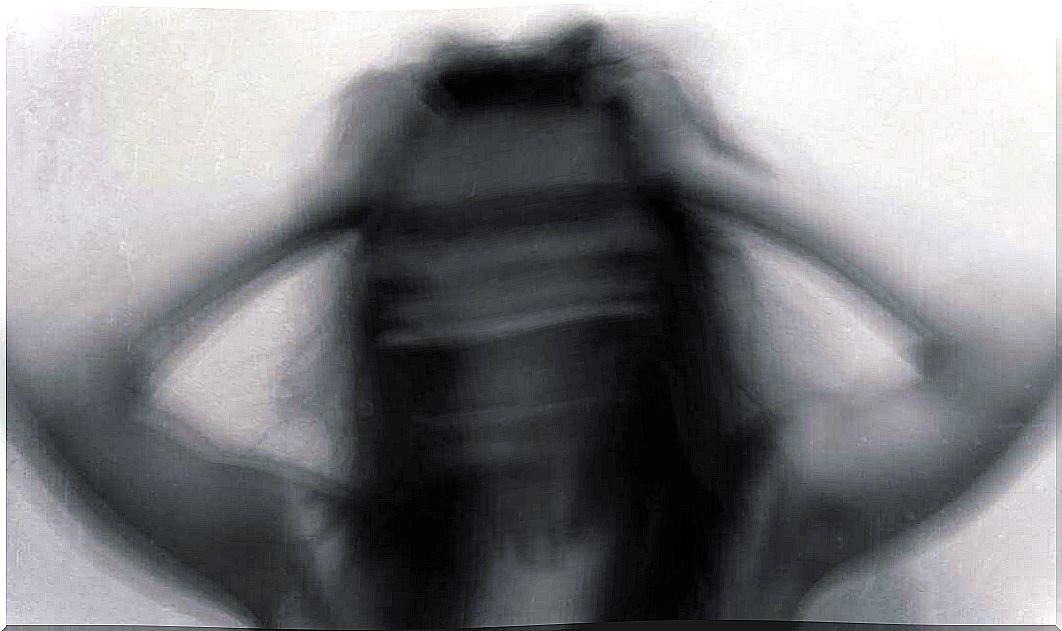 Blurred image of anxious woman