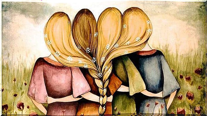 four girls hug each other