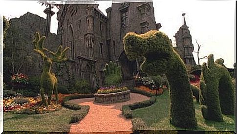 Garden with hedges cut in the shape of animals