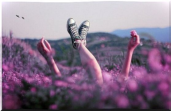 Girl in a field of violets