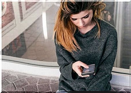 Woman looking at cellphone.