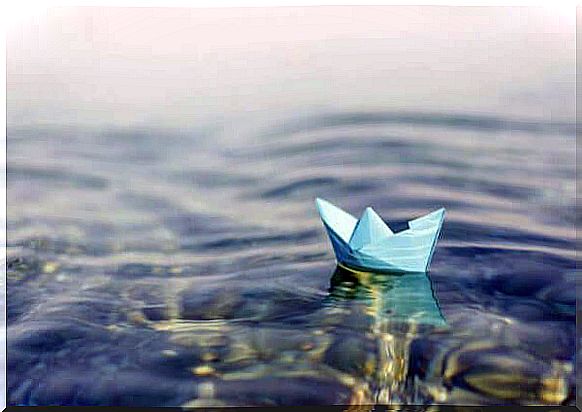 Paper boat on the water