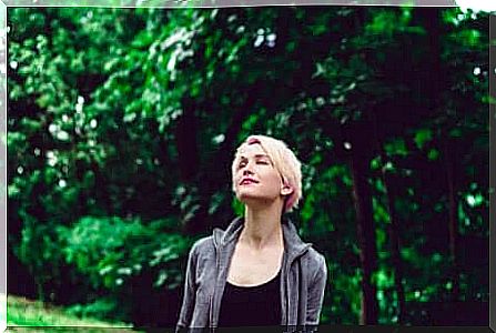 Girl meditates in the fresh air.