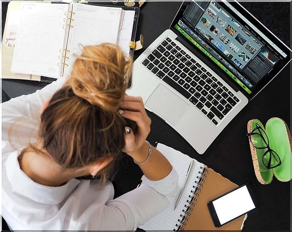 Stressed woman at work