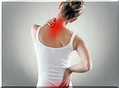 Woman with back and neck pain.