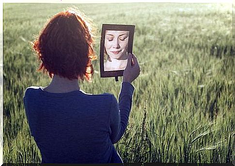 Woman reflected in the mirror 