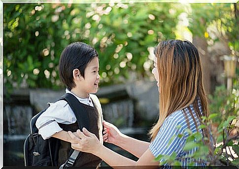 Mom and child going to school