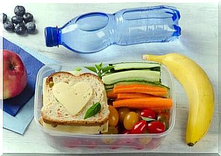 Healthy food and bottle of water.