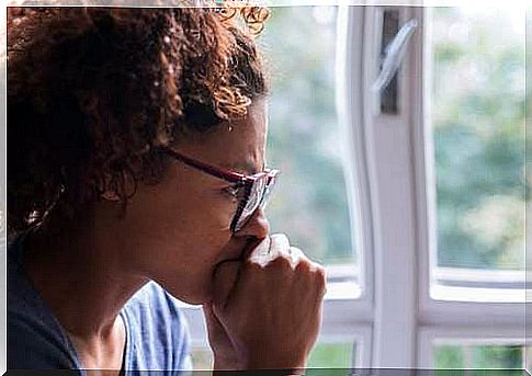 Girl with glasses thinking.