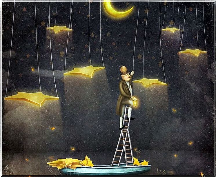 Man on a ladder to hang the stars