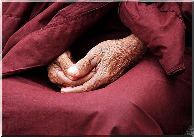 Hands of Buddhist monk